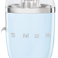 A light blue SMEG Citrus Juicer Collection by Smeg with a stainless steel reamer, anti-drip spout, and clear domed lid.