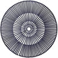 The Kim Seybert Spoke Placemat features a circular black design with evenly spaced radial spokes that create a bold geometric pattern, all converging at a small central hole.