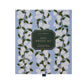 A blue box with white floral designs from the Riffle Paper Co. Blue Hydrangea Desk Accessory Collection contains note cards, envelopes, envelope seals, and a pen—perfect to pair with matching desk accessories.