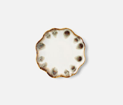 The Amoria Dinnerware Collection by Blue Pheasant features a round ceramic plate with a scalloped edge and brown accents around the rim, offering vintage-inspired elegance against a plain white background.