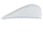 The Weezie Towels Hair Towel Wrap is a white, long, cone-shaped microfiber towel with light blue zigzag stitching; it's soft, absorbent, and customizable to suit your unique style.
