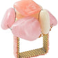 The Kim Seybert Sea Stone Napkin Ring is a square gold wire napkin ring topped with clusters of polished pink and white stones, evoking the look of delicate beach pebbles.