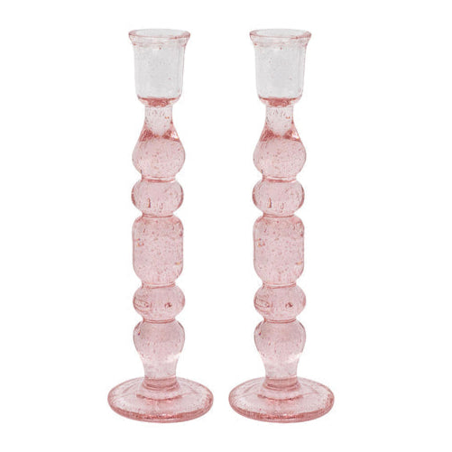 The Provence Candlestick Set by Juliska features two pink mouth-blown glass candlesticks with a stacked, bubble-like design—ideal for adding chic charm to your decor.