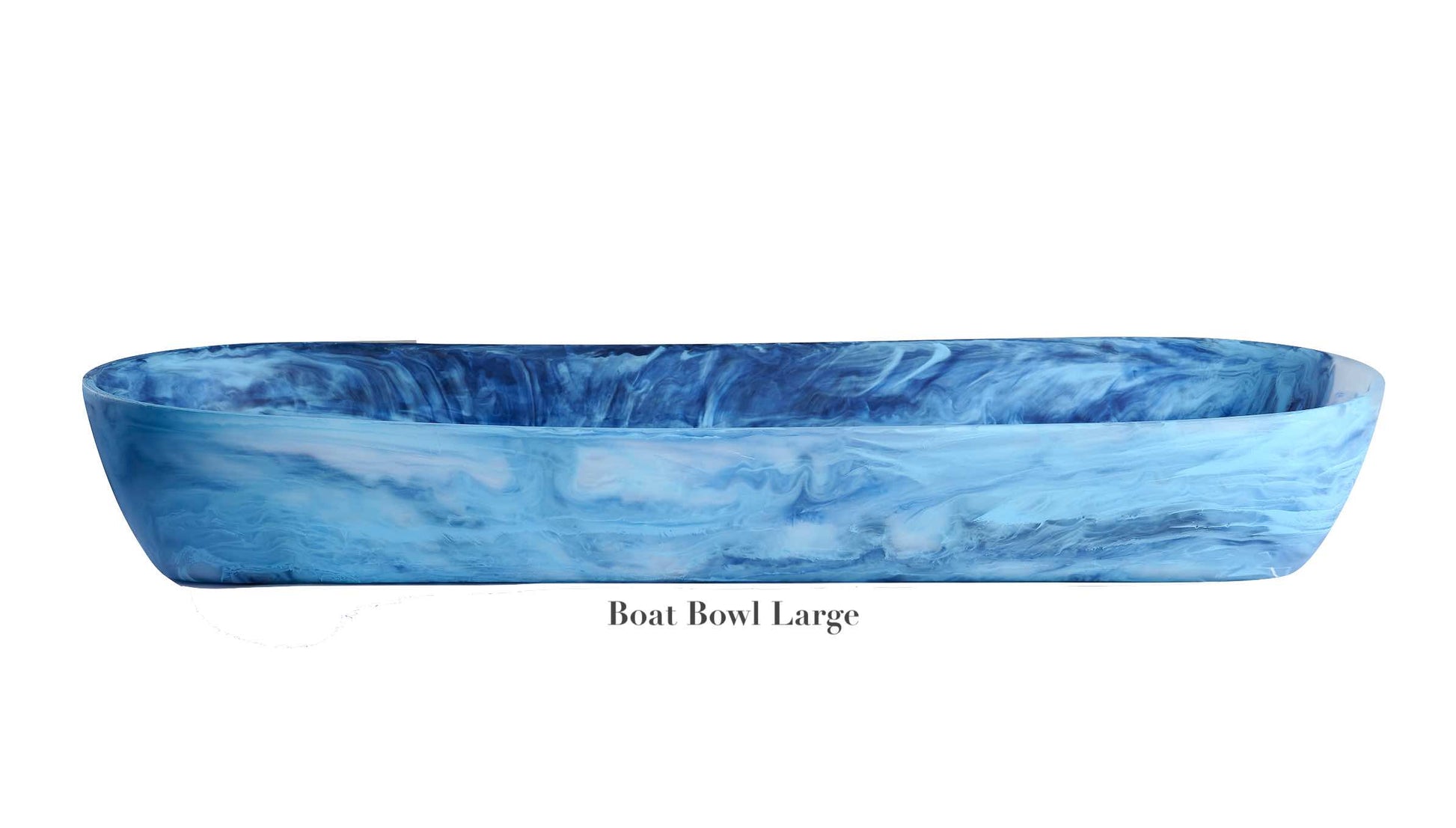 The Denim Resin Serveware Collection by Nashi Home features the large, oval-shaped "Boat Bowl Large" with a blue marbled pattern. This shatter-resistant bowl adds elegant style to your home decor.
