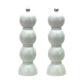 The Hive Bobbin Salt & Pepper Grinder Set features two white, modern mills with a stacked, spherical design, silver tops, and ceramic grinders, displayed side by side on a white background.