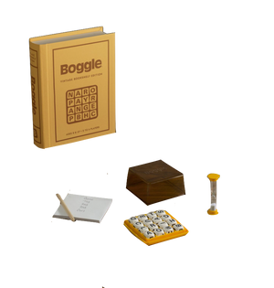 The WS Game Company Boggle Vintage Bookshelf Edition, reminiscent of the classic 1976 Parker Brothers game, includes letter dice, a grid, a sand timer, a notepad, and a pencil, all presented in a book-like box.