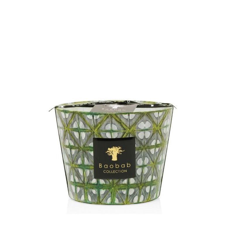 A green and white Baobab Collection Bohomania Lazlo scented candle in a geometric-patterned container.