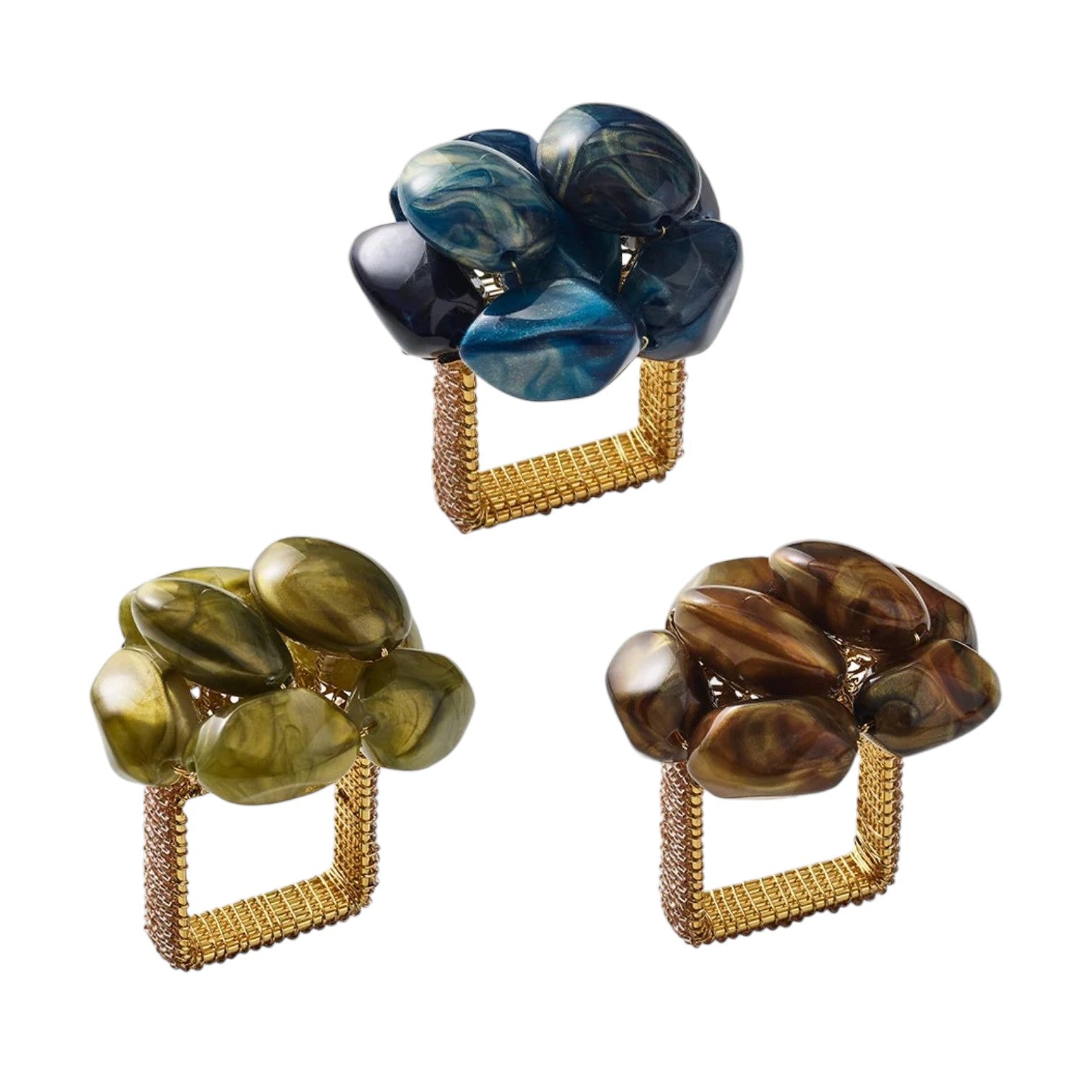 Three Kim Seybert Bonton Napkin Rings, each featuring clusters of glossy marbleized sapphire beads in blue, green, and brown tones atop a gold square base, displayed against a white linen background.