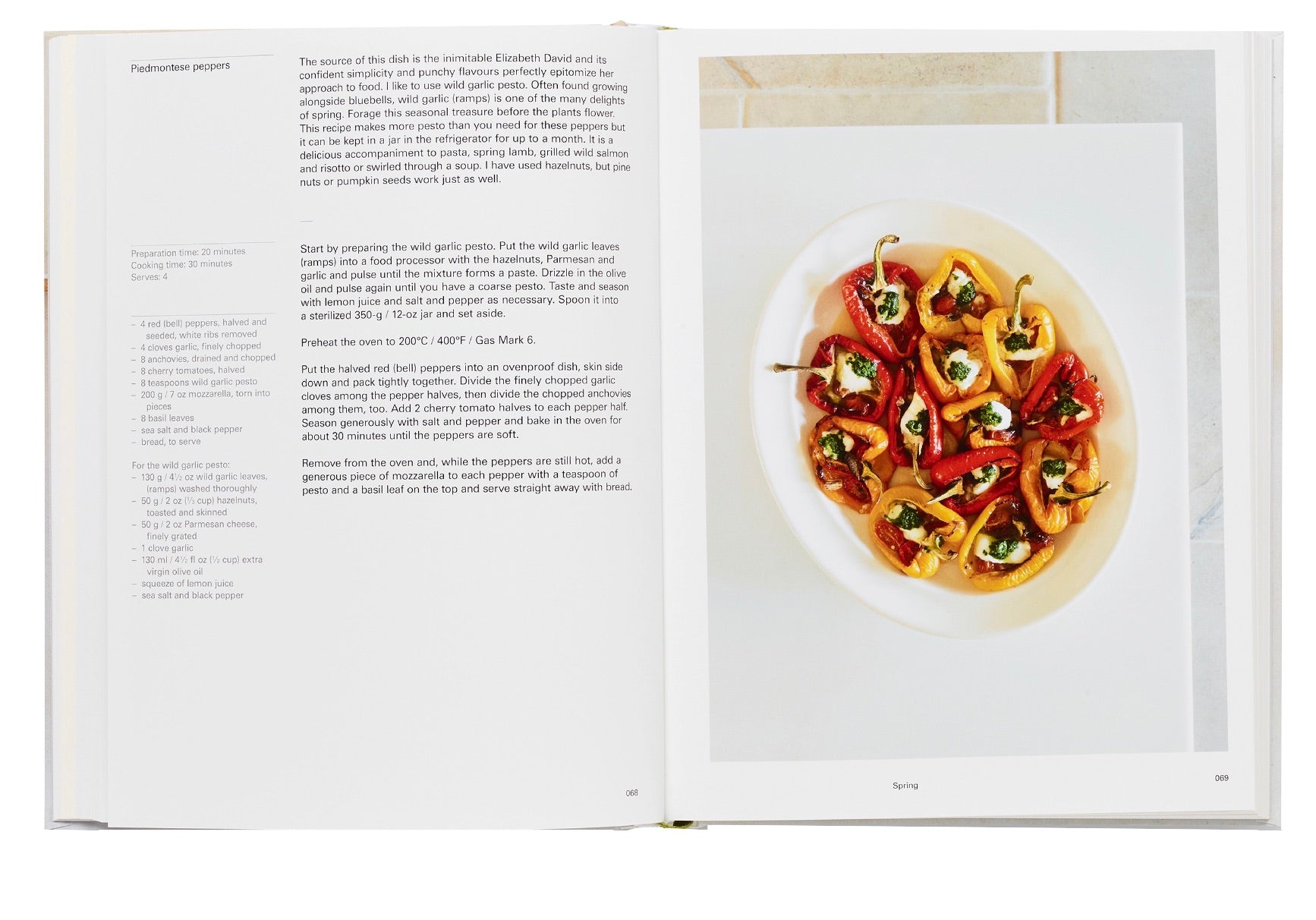 An open Phaidon Home Farm Cooking cookbook from the Phaidon recipe collection displaying a recipe on the left page and a colorful plated dish on the right, likely the completed recipe from the cookbook.