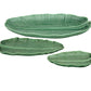 Three green ceramic platters from the HIVE Banana Leaves Platter Collection, handmade in banana leaf shapes with vein details and handles, are displayed on a white background. Part of our elegant Leaves Collection.