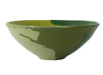 The Geode Bowl Collection by Paul Schneider Ceramics features a green ceramic bowl with a glossy finish and subtle marbled swirls, shown from the side on a white background.