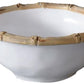 A white luxury melamine bowl with a bamboo-style rim, from Beatriz Ball's break-resistant Vida Natural Bamboo Serveware Collection.