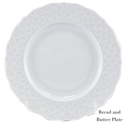 The Empire White Dinnerware Collection by Anna Weatherley features a white porcelain bread and butter plate with a textured lattice-patterned rim. "Bread and Butter Plate" appears in the bottom right corner. Made in Portugal.