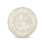Round ceramic plate from the Ginori 1735 Oriente Italiano Meringa Dinnerware & Serveware Collection, featuring a scalloped edge and floral pattern with gold trim, photographed on a white background.