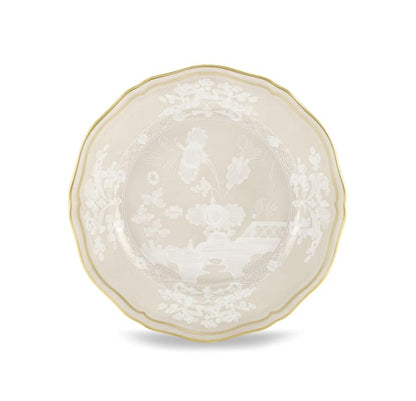 Round ceramic plate from the Ginori 1735 Oriente Italiano Meringa Dinnerware & Serveware Collection, featuring a scalloped edge and floral pattern with gold trim, photographed on a white background.