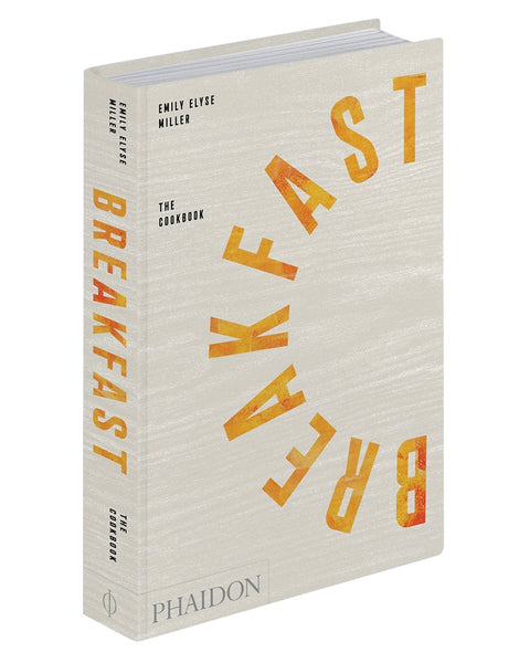 A hardcover cookbook titled "Phaidon Breakfast: The Cookbook" by Emily Elyse Miller, featuring global breakfast recipes and published by Phaidon.