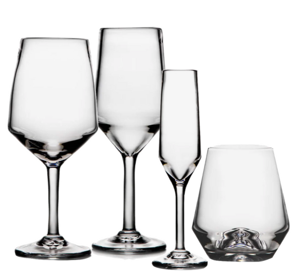 Four types of Simon Pearce Bristol Collection glassware arranged in a row, including three with stems and one wine decanter without, all against a white background.