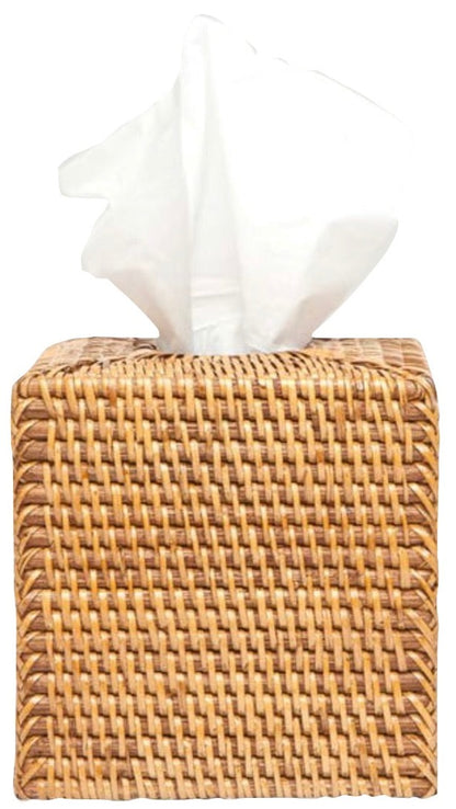 The Dalton Bath Collection by Pigeon & Poodle features a square, handmade rattan tissue box holder with detailed craftsmanship and a white tissue elegantly protruding from the top.