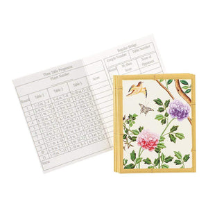 The Caspari Chinese Wallpaper Bridge Collection features scorecards and floral and bird-themed playing cards arranged on a white background—ideal for enjoying bridge or any social card game with friends.