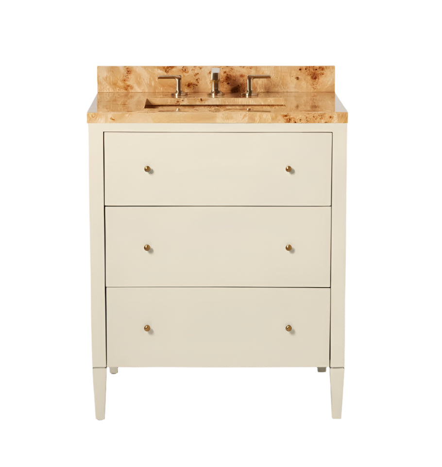 The Conrad Vanity Collection by Made Goods features a modern floating design with a light wood countertop, integrated sink, metal faucet, and three soft-close drawers, displayed against a plain white background.