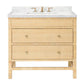 The Isla Vanity Collection by Made Goods offers a light woven finish, three drawers, white marble countertop, and gold faucet fixtures—a refined choice for those seeking freestanding vanities with organic charm.