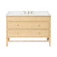 The Isla Vanity Collection by Made Goods showcases style and warmth with its rattan design, marble countertop, brass faucet, and three woven drawers in a light wood finish—perfect for elevating your bathroom.
