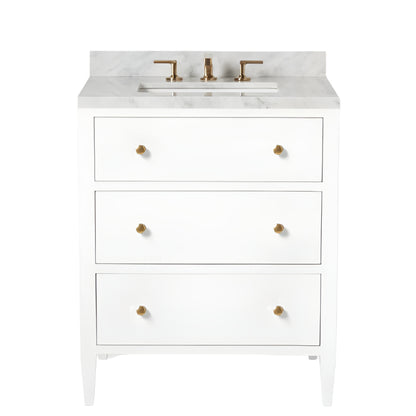 The Jarin Vanity Collection by Made Goods features a white floating vanity with three drawers, gold knobs, a marble countertop, and gold faucet fixtures for a modern bathroom update.