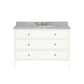 The Jarin Vanity Collection by Made Goods is a freestanding vanity with three drawers, brass knobs, a gray marble countertop, and built-in sink with brass faucet—an elegant upgrade for any modern bathroom.
