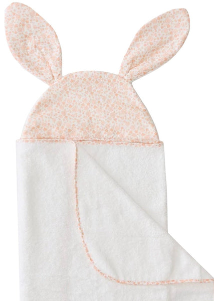 A baby's Weezie Towels Bunny Hooded Towel with rabbit ears; the hood has a pink floral print, and the towel is white with a pink stitched edge, in a limited edition style.