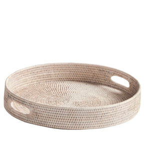 The Burma Whitewash Rattan Round Ottoman Tray Collection by Napa Home & Garden features a round tray with raised sides and oval cut-out handles, ideal for home decor, shown on a white background.