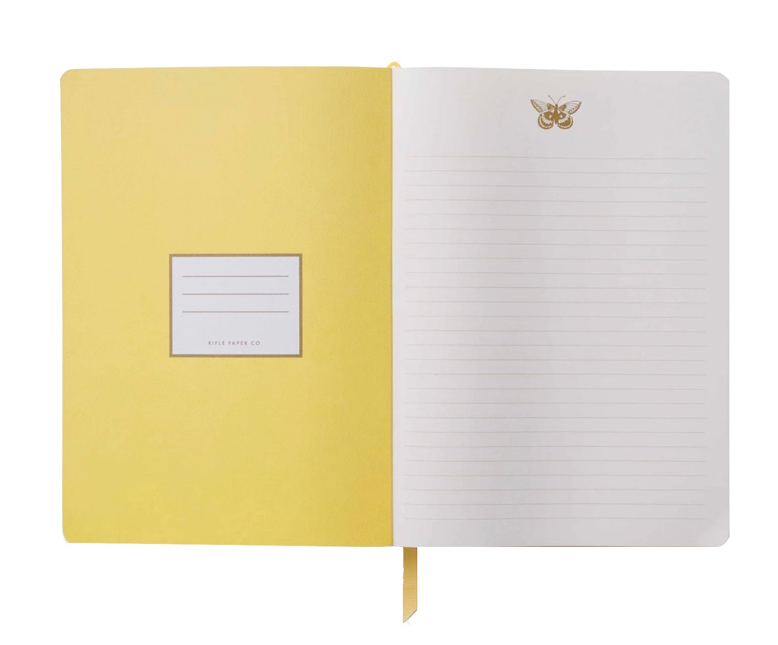 Open notebook from Rifle Paper Co.'s Curio Desk Accessory Collection, featuring a yellow cover, blank label inside, and lined pages with a bee illustration—ideal for garden lovers.
