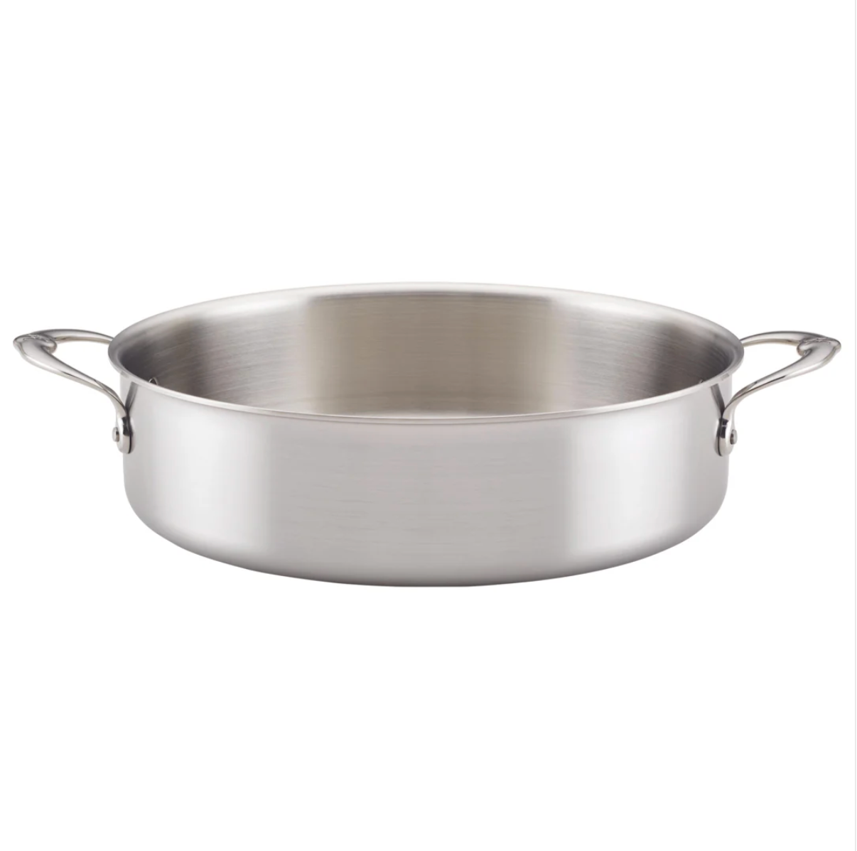 The Hestan Thomas Keller Commercial Clad Stainless Steel Rondeau, 6qt, features a wide, shallow design with two side handles—an eco-conscious cookware option shown on a plain white background.