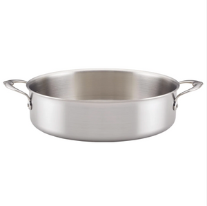 The Hestan Thomas Keller Commercial Clad Stainless Steel Rondeau, 6qt, features a wide, shallow design with two side handles—an eco-conscious cookware option shown on a plain white background.