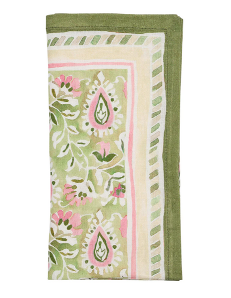 A luxurious Kim Seybert Mira napkin, featuring a folded cloth design with an elegant green, pink, and white floral pattern and border, showcases fine craftsmanship that exudes sophistication.