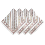 Four Seville Stripe cotton sateen napkins by Juliska are arranged in a fan shape. Each napkin showcases vertical stripes with floral and geometric patterns in earthy tones, inspired by the hand-painted tiles of the Spanish countryside.