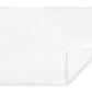 The Matouk Cairo Scallop Bath Collection features a luxurious white quilted mat crafted from long-staple cotton, with scalloped edges and a slightly folded corner.