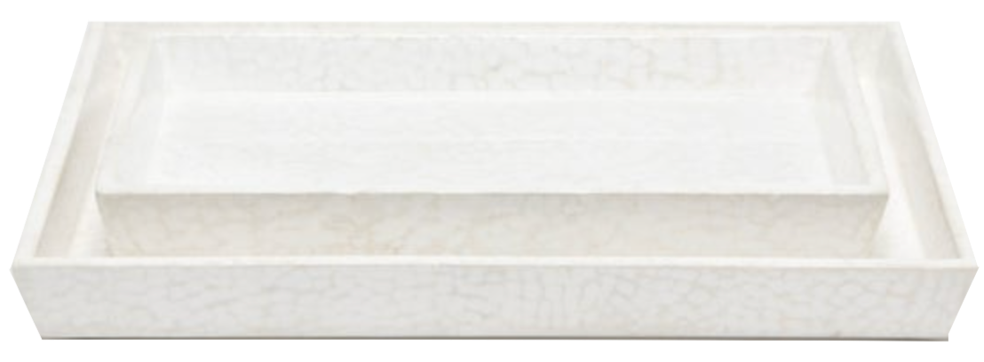 Two nested white trays from Pigeon & Poodle’s Callas Bath Collection, with a lacquered eggshell-like cracked texture, are stacked together against a plain background.