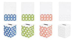 Four hand towels and four matching tissue box covers from Haute Home’s Cane Bath Collection, crafted from white Italian linen and featuring geometric patterns in blue, green, coral, and white, arranged in a row on a white background.