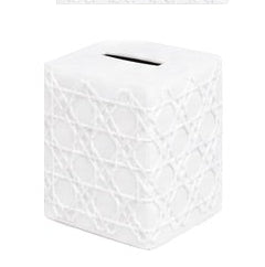 The Haute Home Cane Bath Collection features a white ceramic cube-shaped piggy bank with a geometric textured pattern, reminiscent of an elegant tissue box cover, and a coin slot on top.
