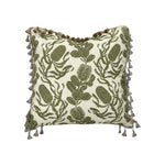 The Cape Botan Pillow by Hive Custom Pillows features a green embroidered leaf and pod design on a light background with tasseled edges, perfect for those seeking a luxurious decorative accent.