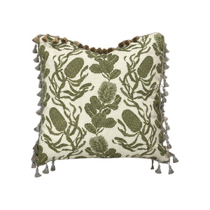The Cape Botan Pillow by Hive Custom Pillows features a green embroidered leaf and pod design on a light background with tasseled edges, perfect for those seeking a luxurious decorative accent.