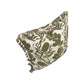 The Cape Botan Pillow by Hive Custom Pillows features a green botanical pattern on white, decorative tassels along the edges, and is crafted from premium materials for a luxurious touch.