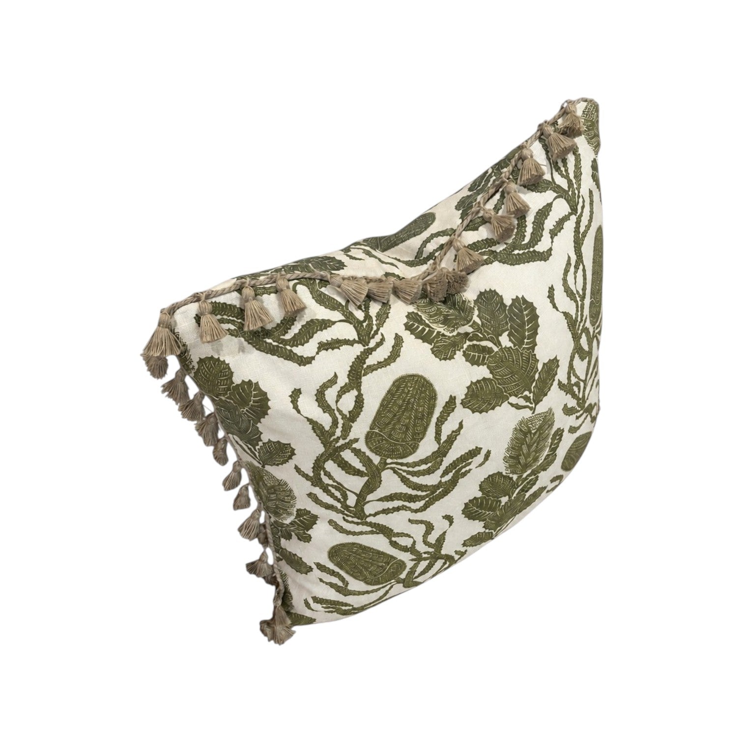 The Cape Botan Pillow by Hive Custom Pillows features a green botanical pattern on white, decorative tassels along the edges, and is crafted from premium materials for a luxurious touch.