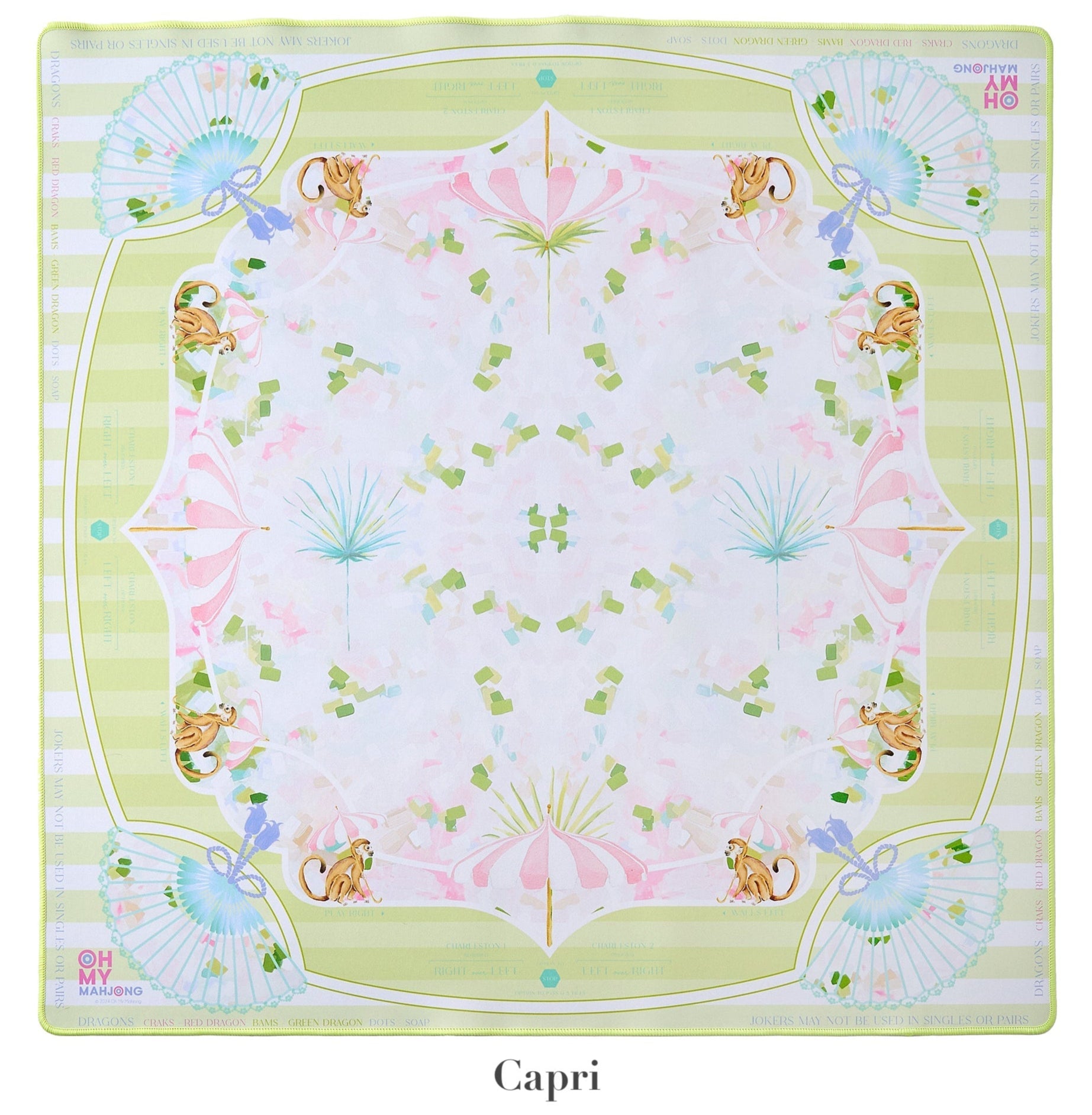 A square scarf from the Oh My Mahjong Mat Collection by Oh My Mahjong, featuring a symmetrical design with fans, umbrellas, and foliage in pastels on a pale background. Reminiscent of Mahjong mats, the border reads "Oh Mai Oh My!" and "Capri.