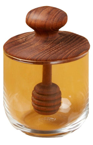 The Be Home Mini Teak and Glass Honey Jar includes a glass jar with a handcrafted teak lid and an attached sustainably sourced wooden honey dipper.