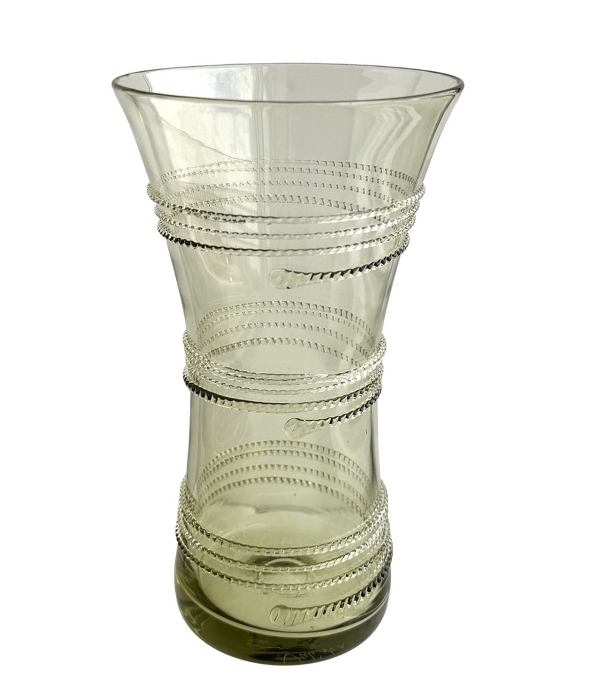 The Juliska Ella Corset Vase Collection features a clear glass vase with an elegant hourglass silhouette and corseted waistline, enhanced by spiral ribbed detailing around the center and upper half. Whether displayed as a decorative accent or used as a floral centerpiece, this vase stands out beautifully against any plain white background.