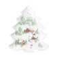 The Berry & Thread North Pole Tree Platter Collection by Juliska features a ceramic platter shaped like a Christmas tree, adorned with snowy cabins, evergreen trees, and festive winter scenes.