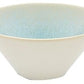 The Vuelta Ocean Blue Collection bowl by Jars features a wide-rimmed white ceramic design with a light blue interior and an elegant ocean-inspired glaze.