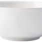 The Juliska Puro Whitewash Dinnerware Collection features a smooth, glossy ceramic bowl in crisp white—ideal for serving tapas or presenting teatime treats, seamlessly blending into any table setting with its versatile design.