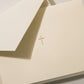 The Crane Gold Cross Note Card Set features cream-colored cotton paper cards with a small gold cross in the center, paired with matching envelopes.